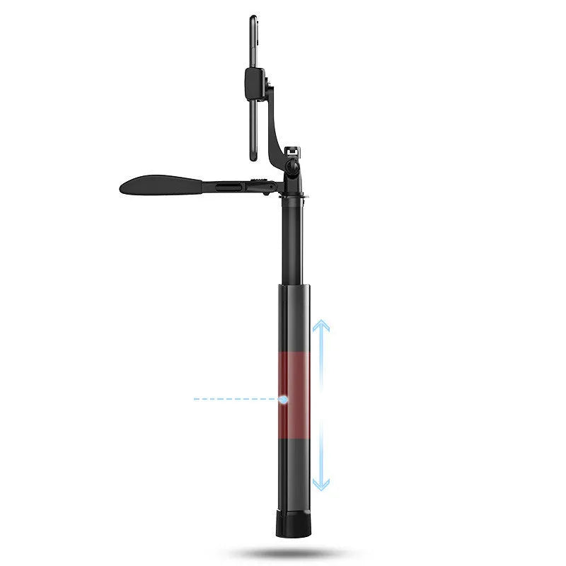 Extended black aluminium Bluetooth selfie stick with tripod legs and remote control for mobile phone.