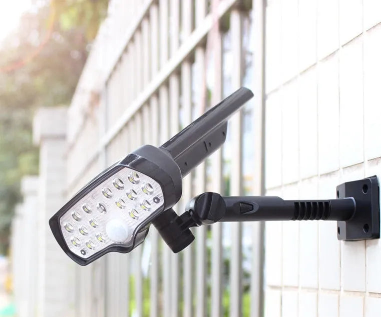 Black solar outdoor garden light with 17 LED beads, 6000-6500K output, IP65 waterproof rating, and 2200mAh battery