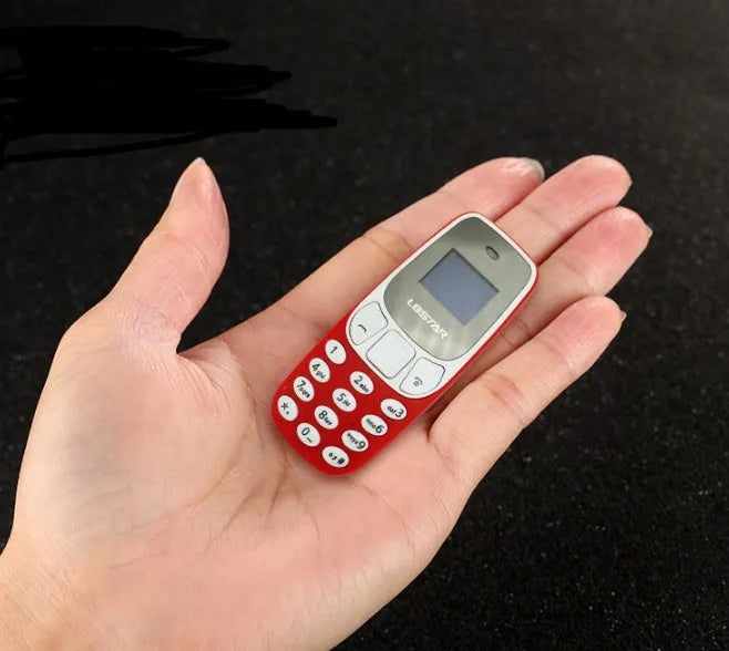 Miniature thumb phone dual SIM ultra-small OLED display blue colour front view