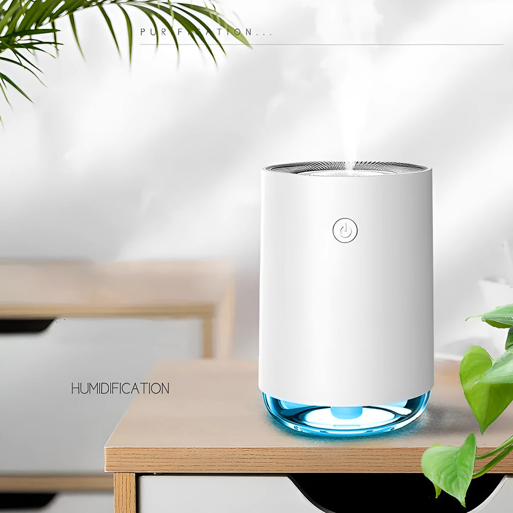 Portable USB humidifier diffuser night light unit in green colour on white surface