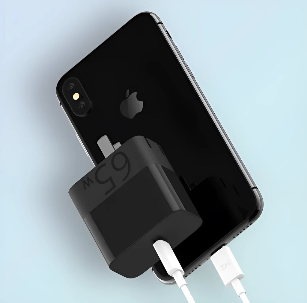 Black ZMI USB-C 65W laptop power adapter with compact design and notebook charging capability