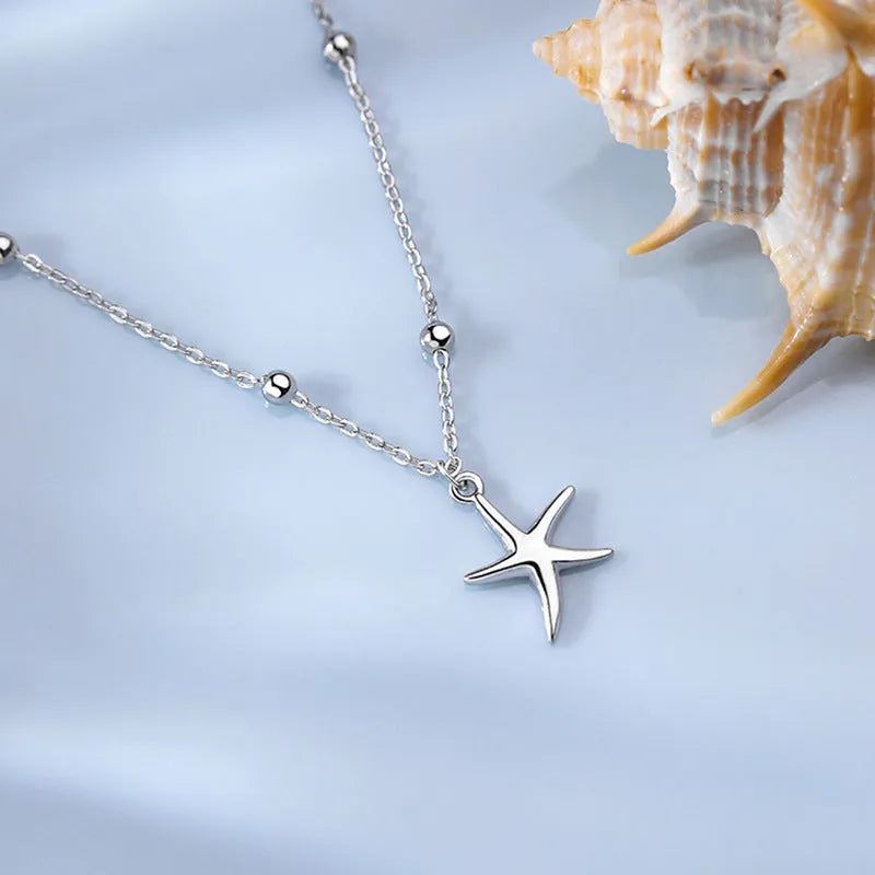 Sterling silver starfish anklet with round beads for women