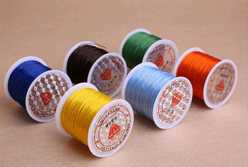 Elastic wire chain rubber beading cord for bracelets and necklaces, shown in assorted colours
