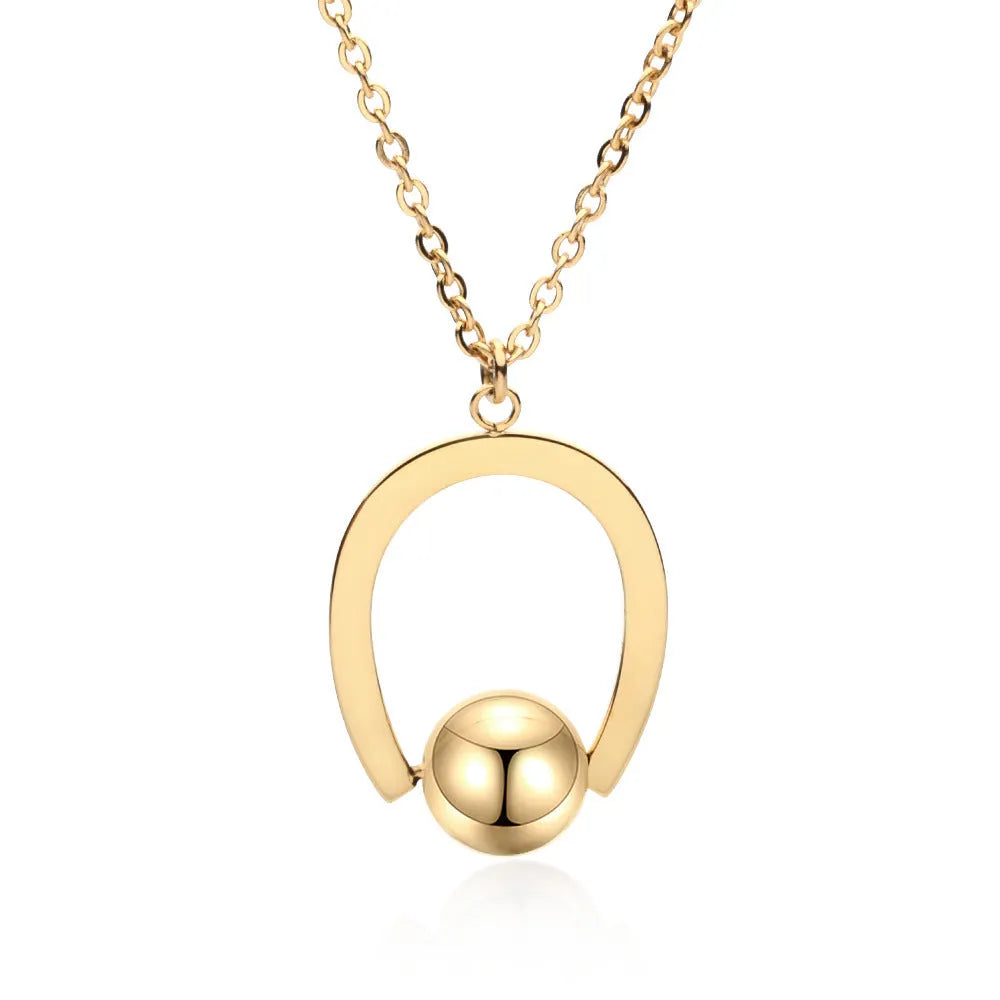 Gold stainless steel geometric pendant necklace on a cross chain, adjustable from 21cm to 50cm