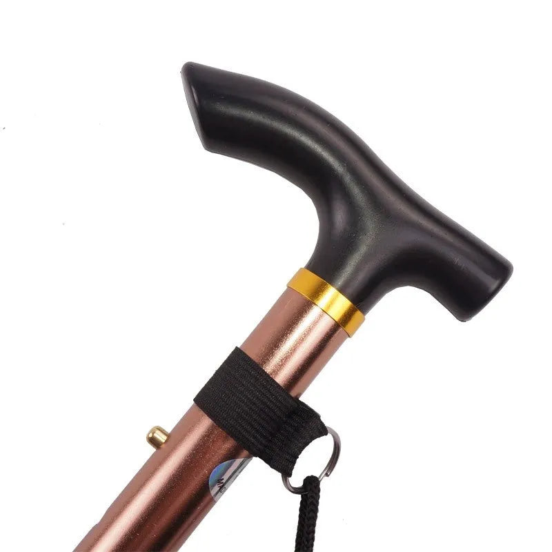 Aluminium folding walking cane extended to show adjustable shaft and textured non-slip handle.