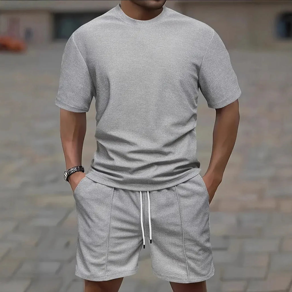 Men's apricot waffle texture short sleeve blouse and matching shorts set laid flat