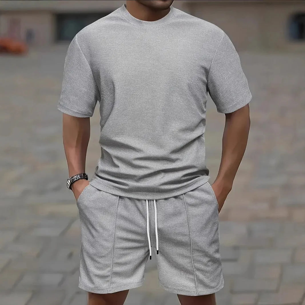 Men's apricot waffle texture short sleeve blouse and matching shorts set laid flat
