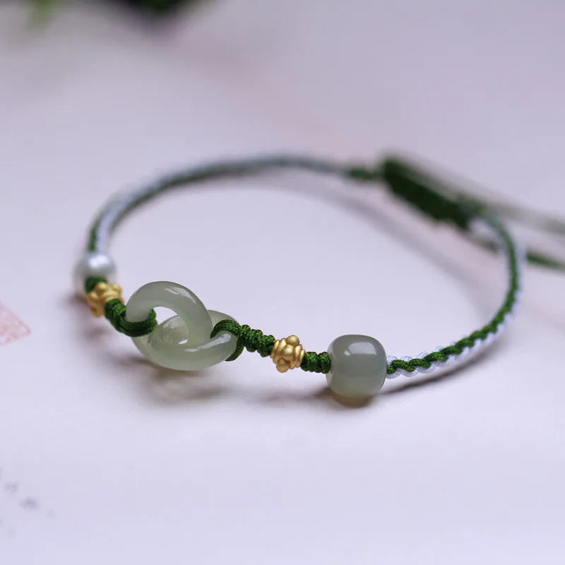 Hetian jade woven bracelet with flexible wire construction and hollow out national tide design elements