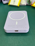 White magnetic wireless charger power bank showing creative design with 5000mAh capacity