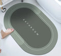 Diatomite bath mat with natural rubber backing in Baikal blue colour, oval shape