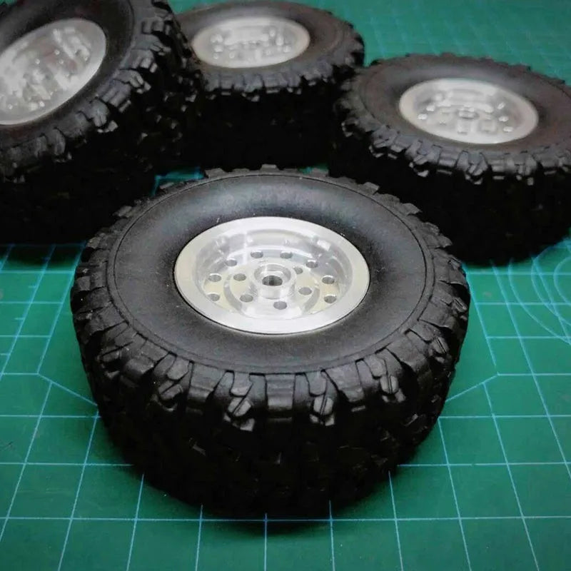 Silver stainless steel RC car wheel upgrade part with 68mm outer diameter and 5mm hexagon.