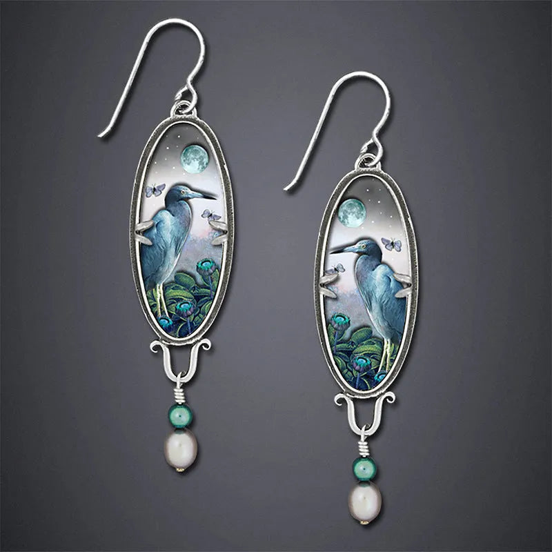 Silver retro bird flower drop earrings with electroplated metal construction