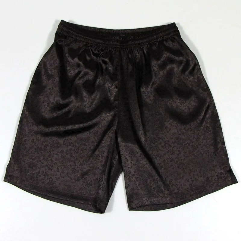 Men's black Tang suit shorts with an elastic drawstring waistband on a white background.