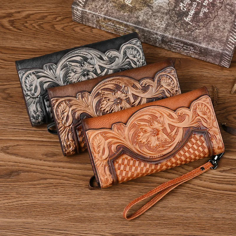 Brown tri-fold women's wallet with Chinese floral embossed pattern on cowhide leather.