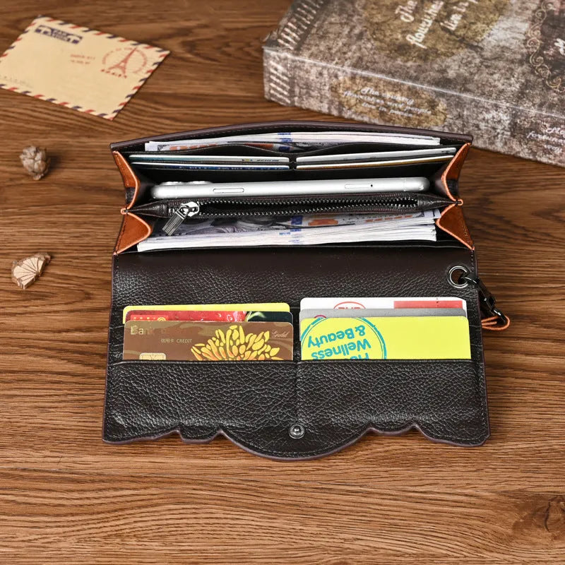 Brown tri-fold women's wallet with Chinese floral embossed pattern on cowhide leather.