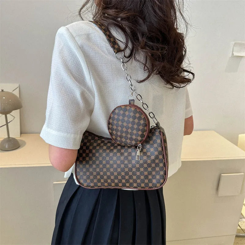 Small square PU leather shoulder bag in beige with detachable small bag on white background