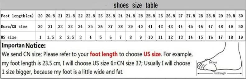 Women's black and white leather casual shoes with thick wedge sole and lace-up front.