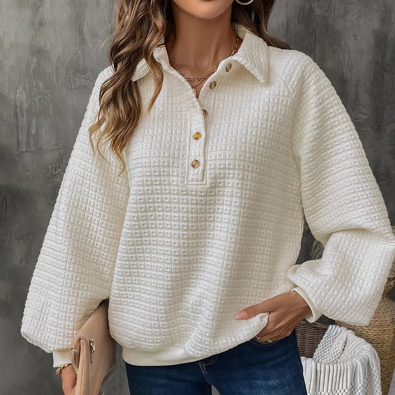 Women's milky white textured polo collar sweater on a hanger.