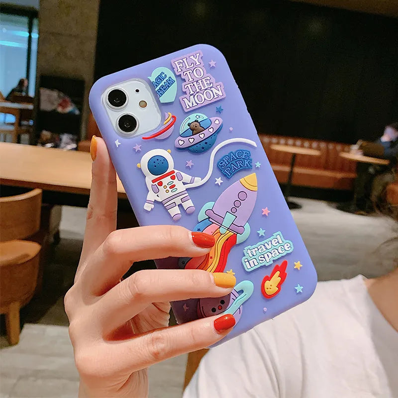 Purple silicone iPhone case with cartoon astronaut design for multiple iPhone models