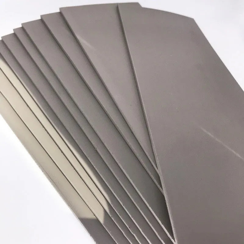 Black and grey plastic photosensitive seal pad sheet for calligraphy and pottery stamp making.
