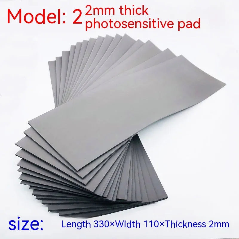 Black and grey plastic photosensitive seal pad sheet for calligraphy and pottery stamp making.