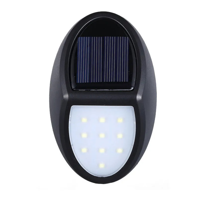 Black rectangular solar-powered LED wall light for outdoor automatic lighting.