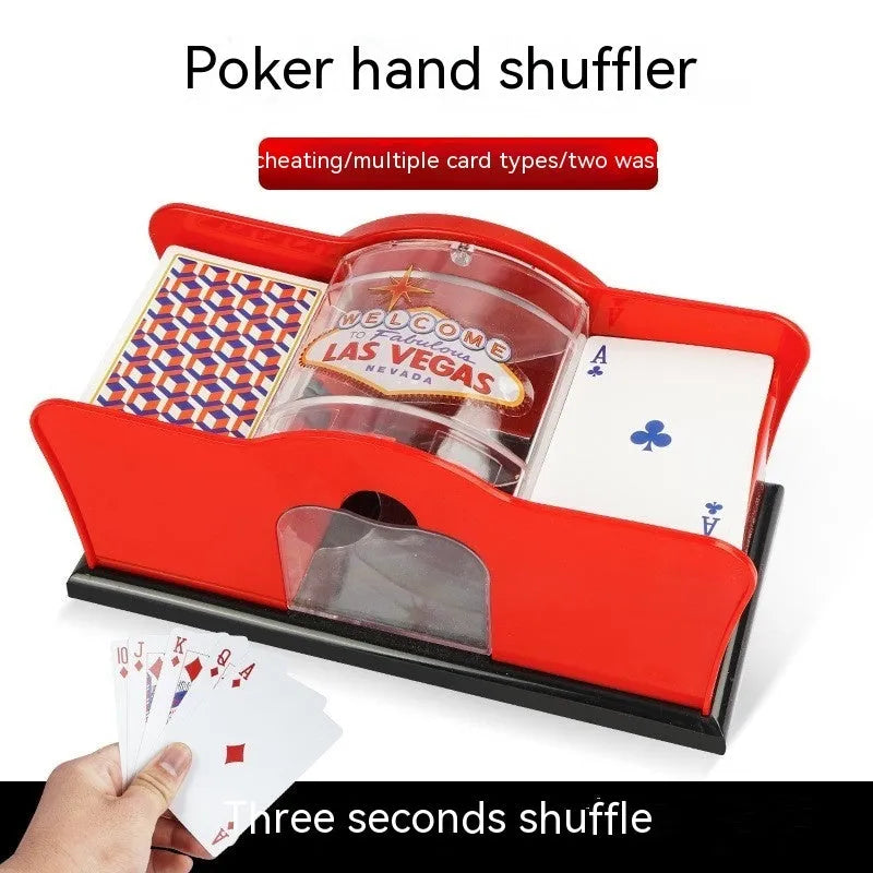 Black and red manual hand-crank card shuffler machine for casino games on a table.
