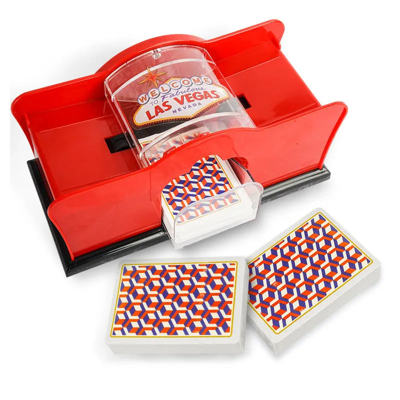 Black and red manual hand-crank card shuffler machine for casino games on a table.