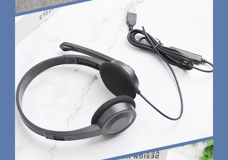 Black USB wired gaming headset with microphone, sponge ear pads and PVC cable for PC computer use