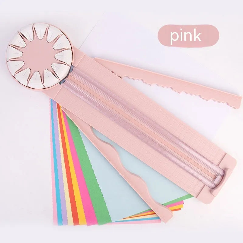 Pink and black multifunctional 12-in-1 dotted plastic paper cutter machine for crafts.