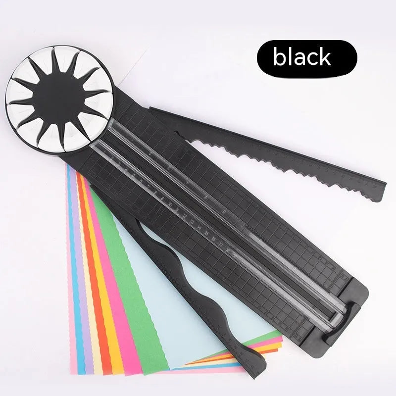 Pink and black multifunctional 12-in-1 dotted plastic paper cutter machine for crafts.