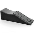 Black car seat pad with removable cover on a vehicle seat.