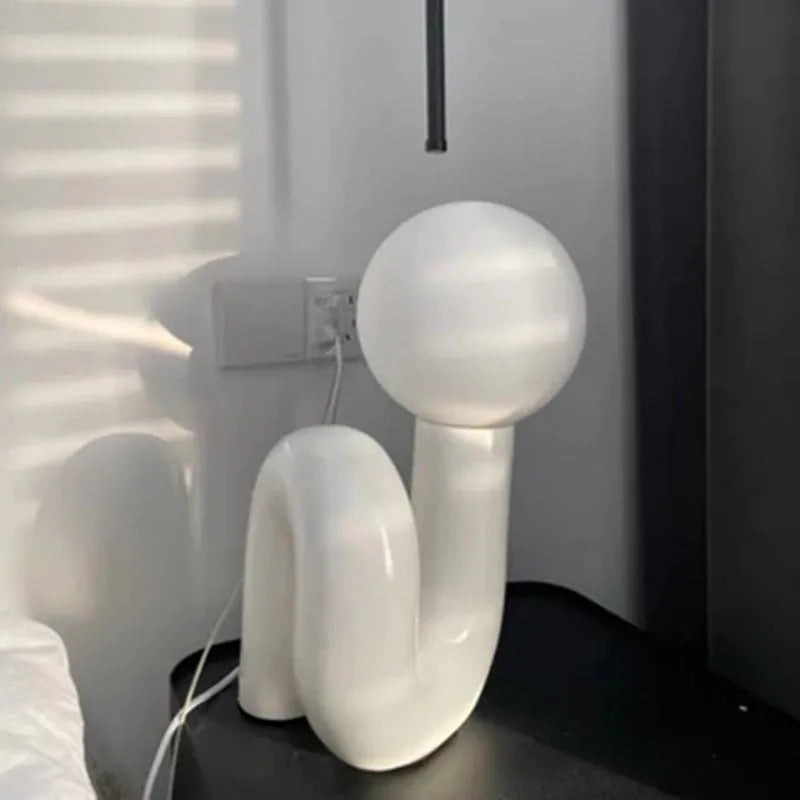 Pink and white resin bedside lamp with graphic customisation option for children's bedrooms