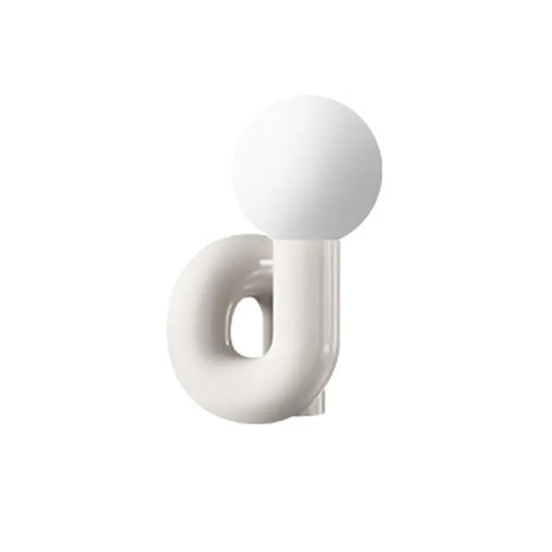 Pink and white resin bedside lamp with graphic customisation option for children's bedrooms