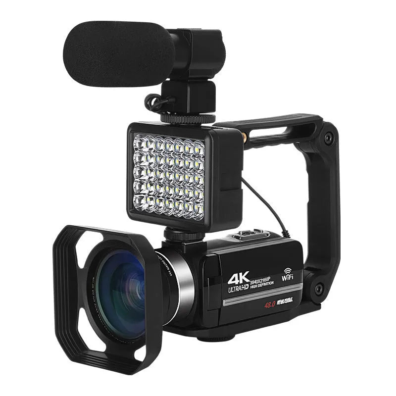 Black WIFI digital HD night vision camera with 3-inch screen showing menu, beside its included lens cover and remote control.
