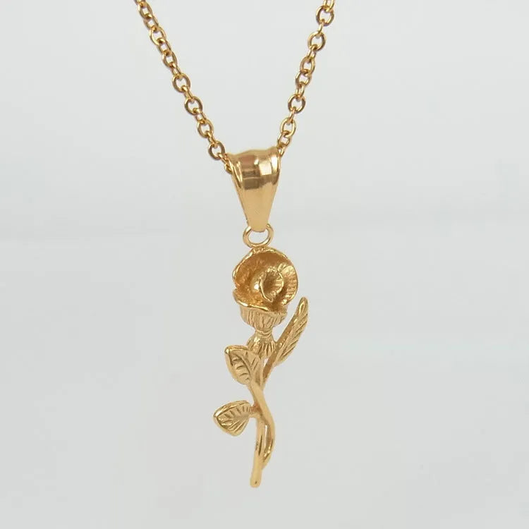 Polished stainless steel men's necklace with cross and rose pendant, gold colour, on display