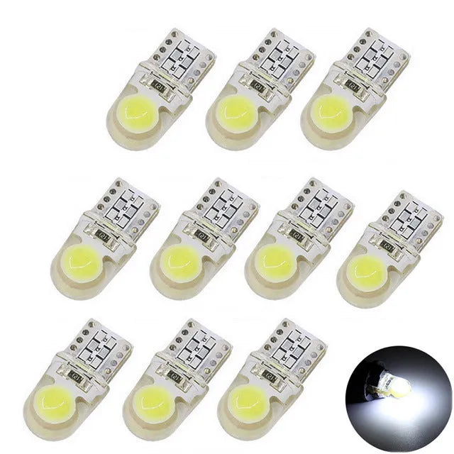 Pack of ten multi-colour T10 LED bulbs for 12V car side marker and interior light replacement.