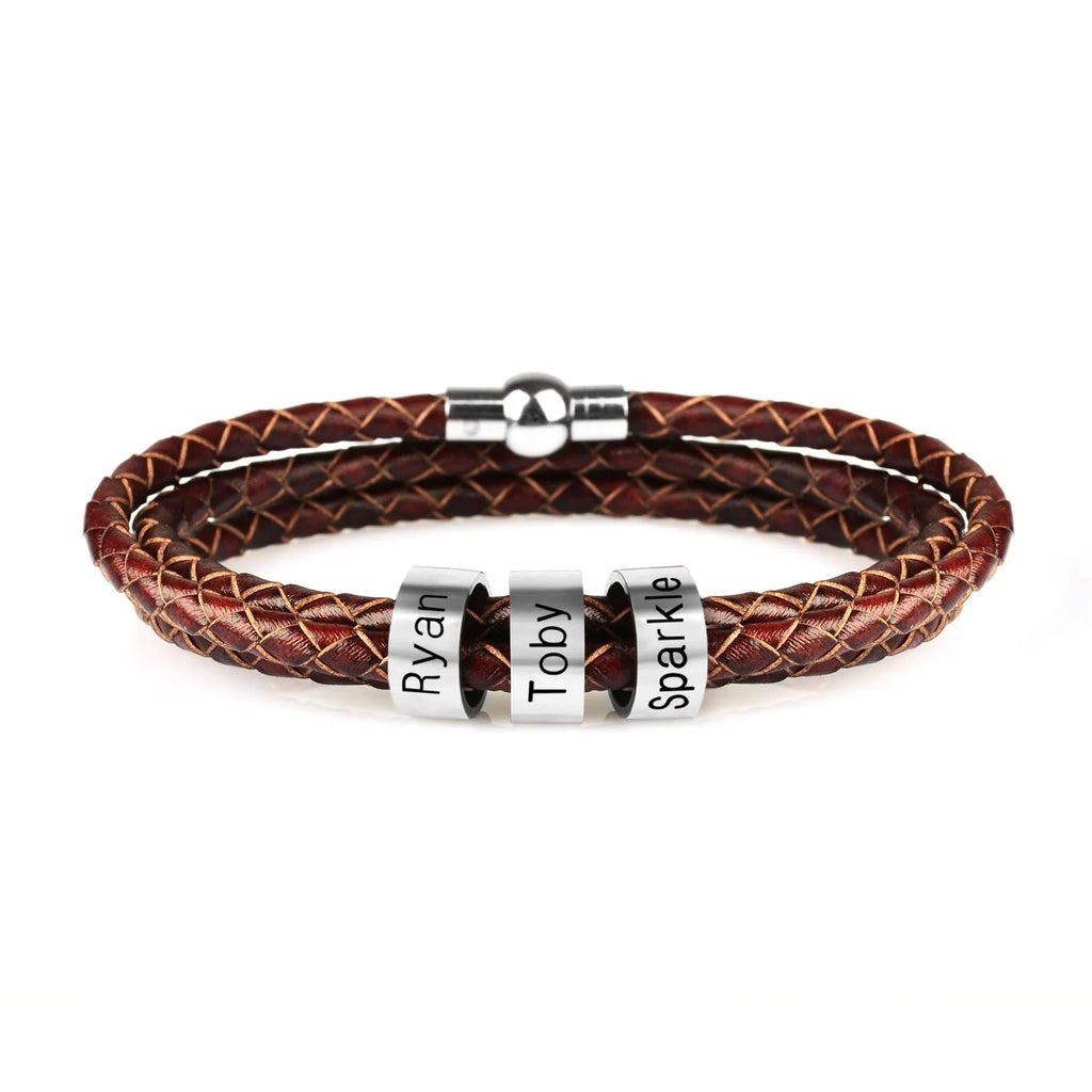 Personalised mens braided genuine leather bracelet in black with custom stainless steel name beads showing engraved names