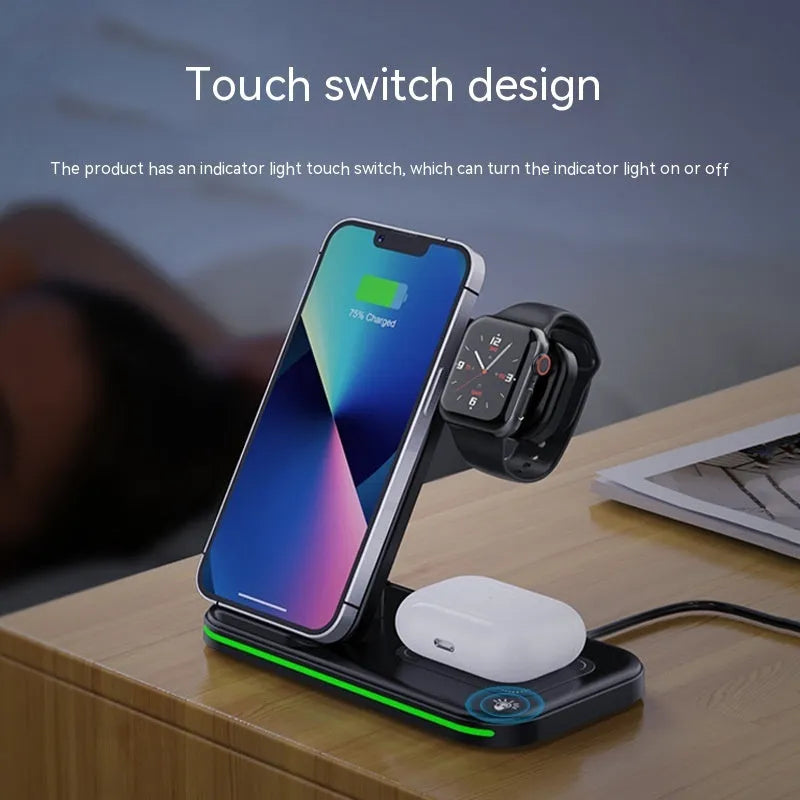 Wireless foldable fast charger in black charging a phone, headset, and watch on a desk