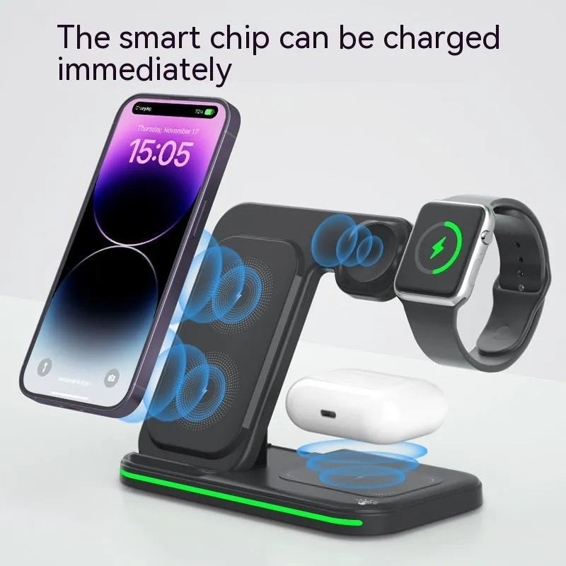 Wireless foldable fast charger in black charging a phone, headset, and watch on a desk