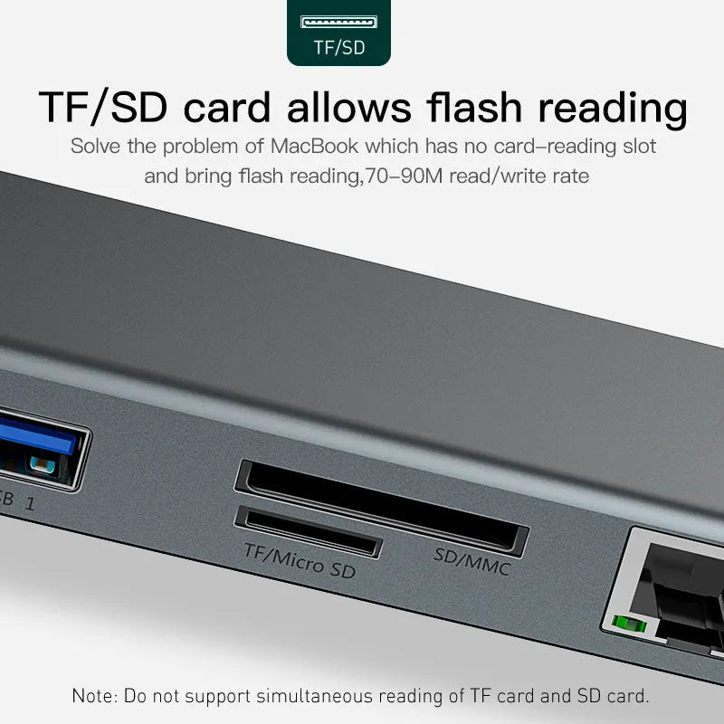 Grey aluminium alloy USB-C hub with cooling bracket showing ten ports including HDMI, VGA, Ethernet and USB