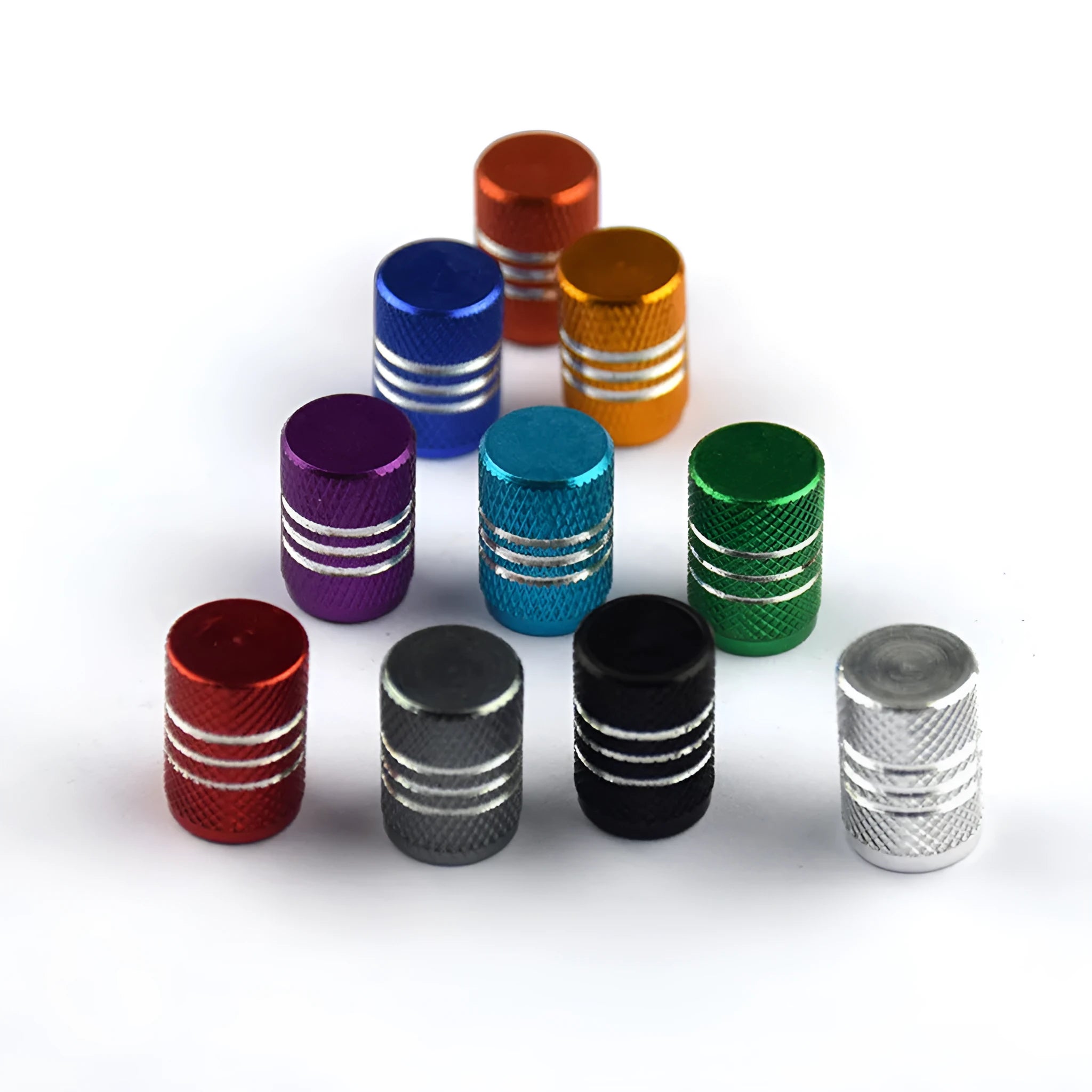 Set of stainless steel car tyre valve caps in multiple colours including red, blue, black, and silver.