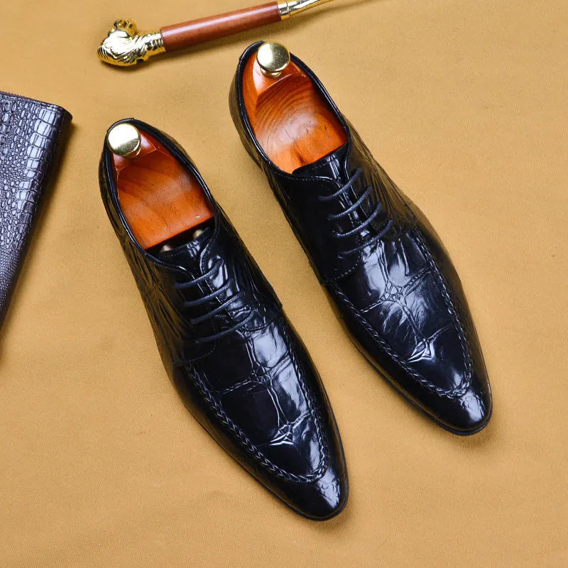 Men's black Korean-style leather formal shoes with alligator pattern and metal horse bit buckle on a rubber sole.