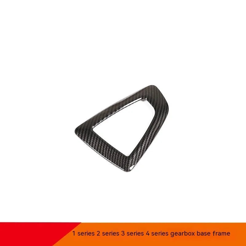 BMW carbon fibre pattern gear base frame panel measuring 13cm by 9cm