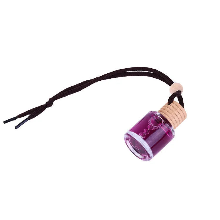 Car air freshener glass bottle hanging ornament showing scent options: Lavender, Lemon, Apple, Strawberry, Ocean, Floral.