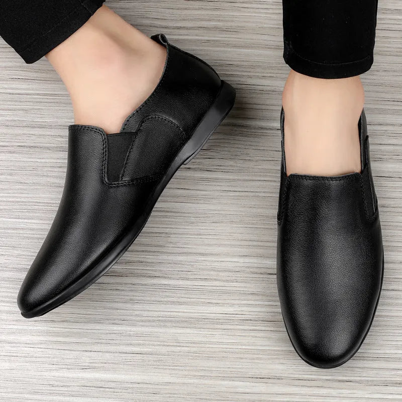 Men's black and brown leather business casual shoes with round toe on a white background.