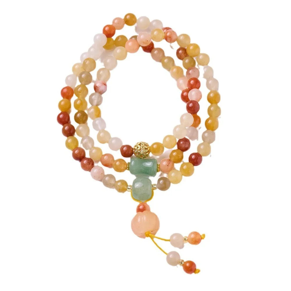 Women's handcrafted three-circle pumpkin jade bracelet with gold tassels