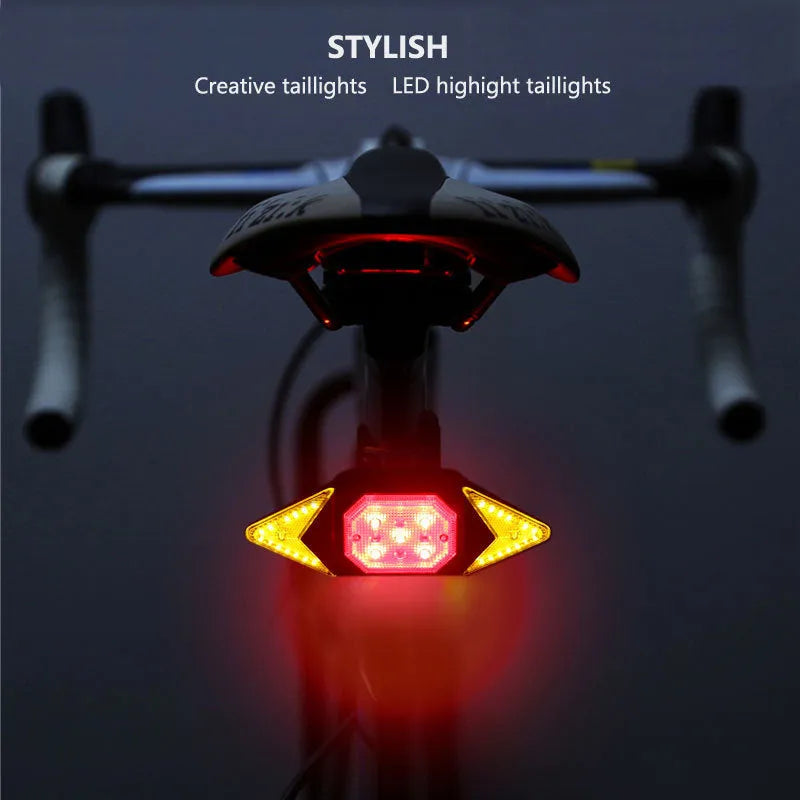 USB rechargeable bicycle turn signal with remote control, black, showing red and blue flashing LEDs