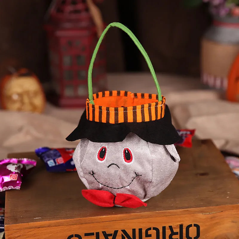 Halloween candy bag with pumpkin pattern design measuring 16cm by 16cm