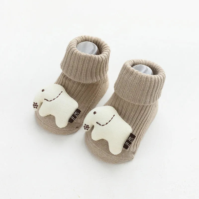Children's combed cotton non-slip socks in multiple colours for sizes XS, S, and M.